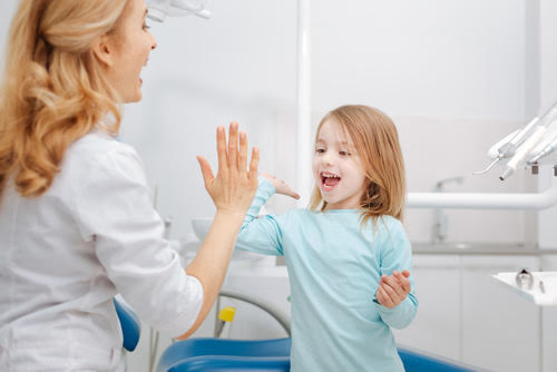 girl, woman, high five, dentist, dental care for kids, dentist in vaughan